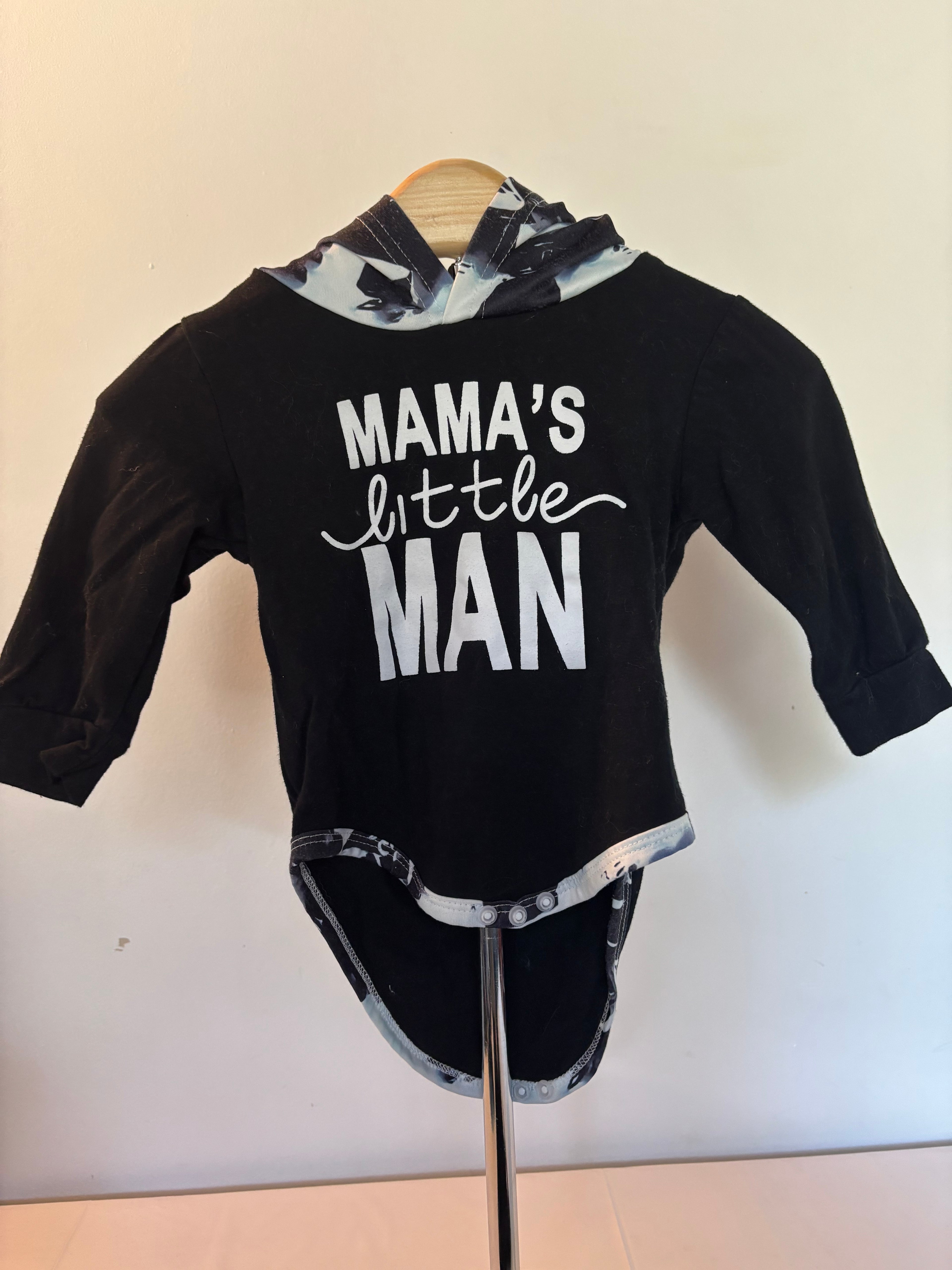 Baby boy's two-piece outfit  "MAMA'S little MAN" (printed in white) matching pants with a black and white abstract print stripe down the side