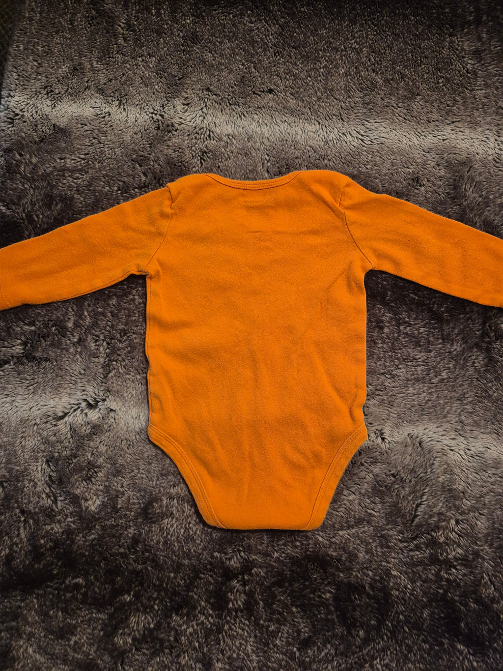 Long sleeved onesie “my uncle rocks”