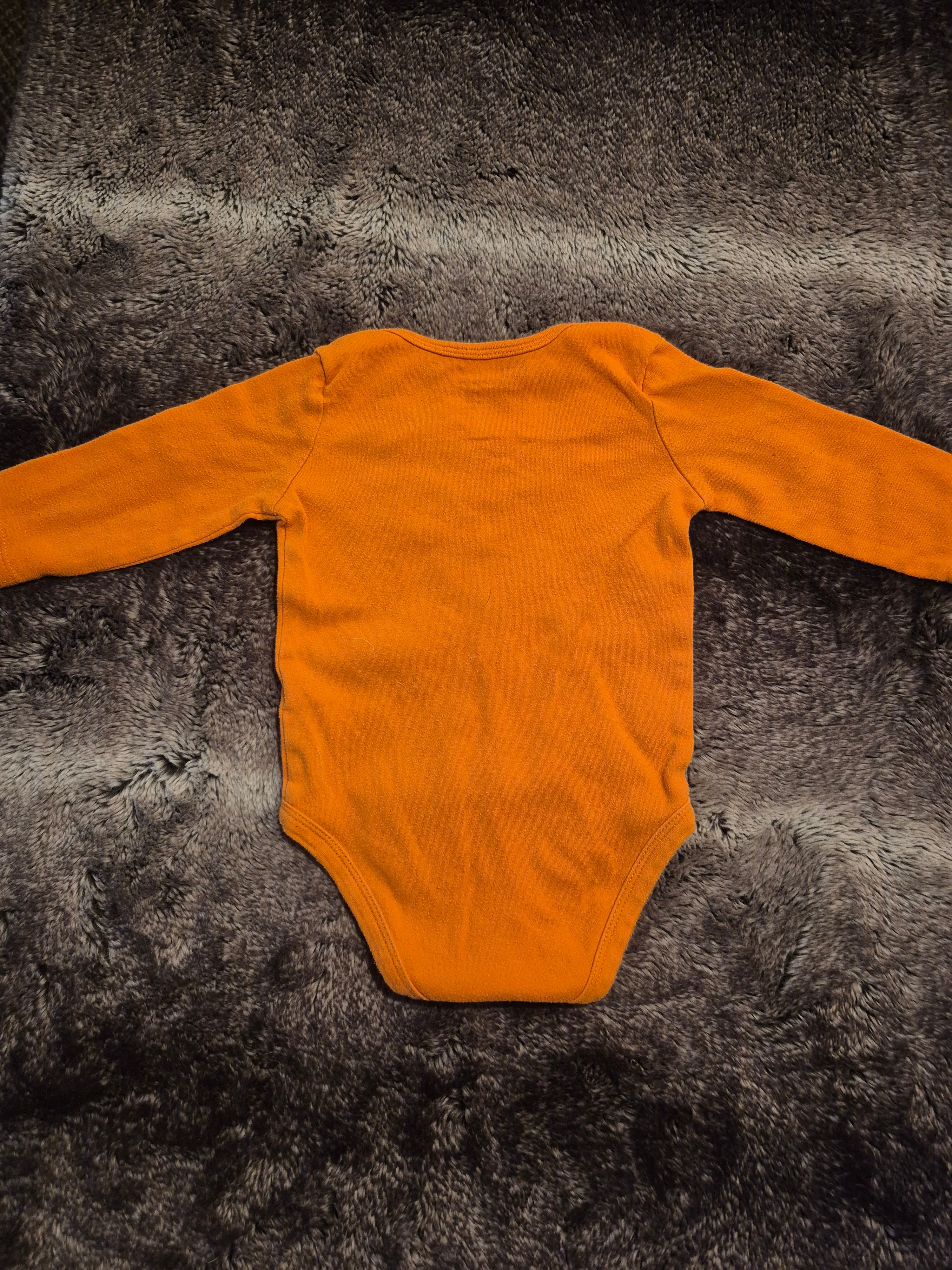 Long sleeved onesie “my uncle rocks”