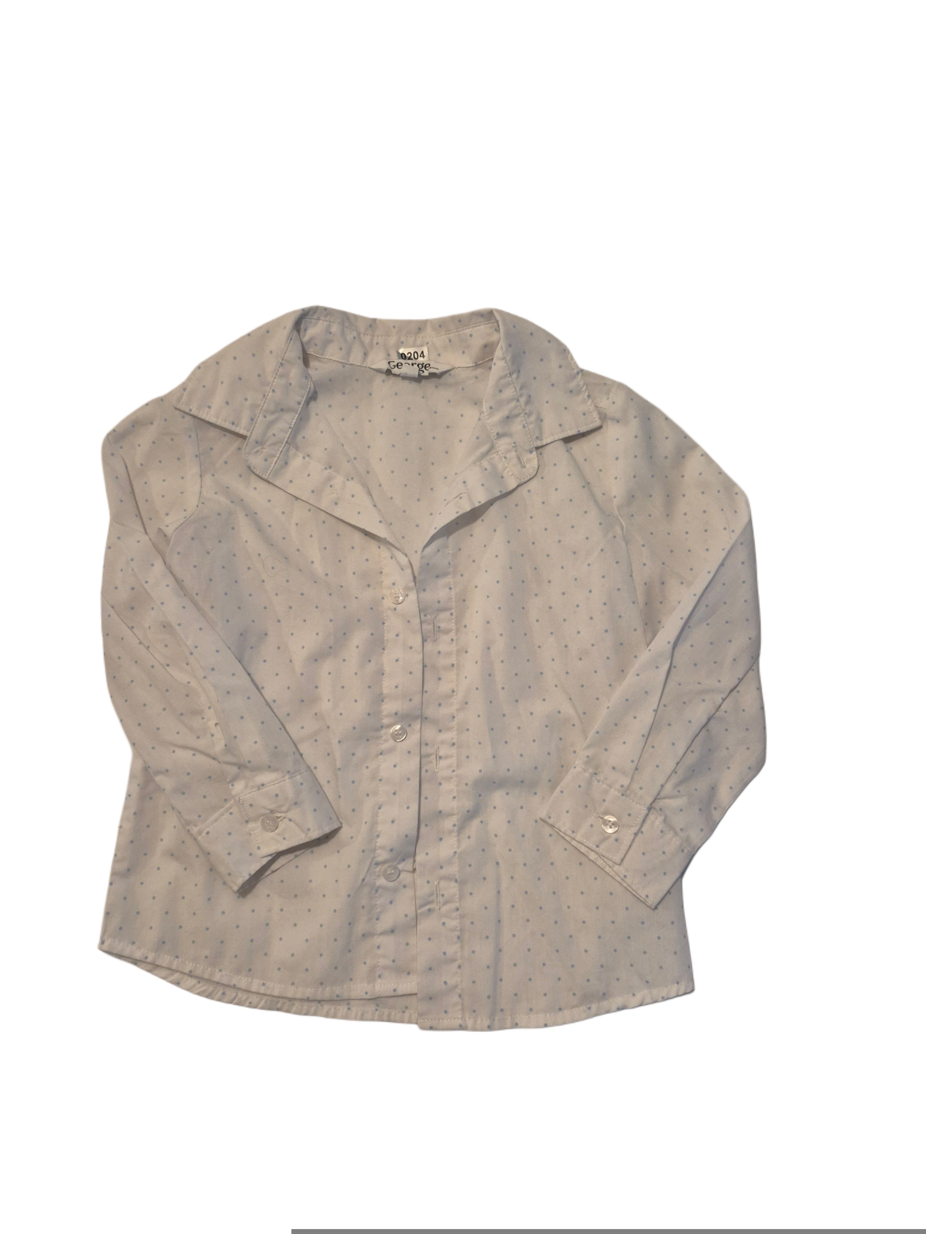 White buttoned up long sleeved shirt