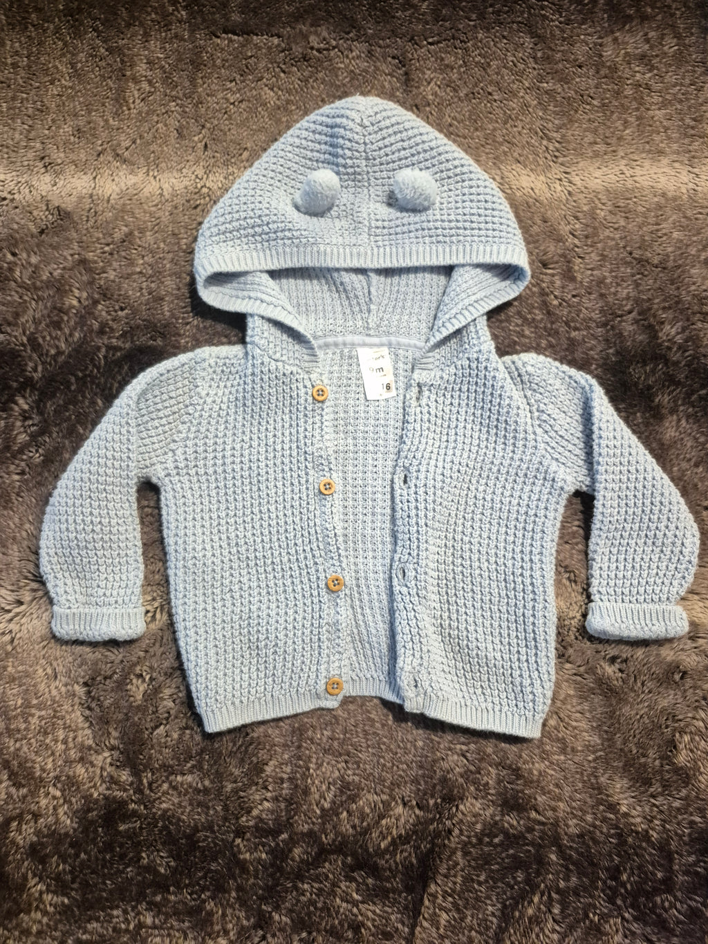 Knitted button up sweater