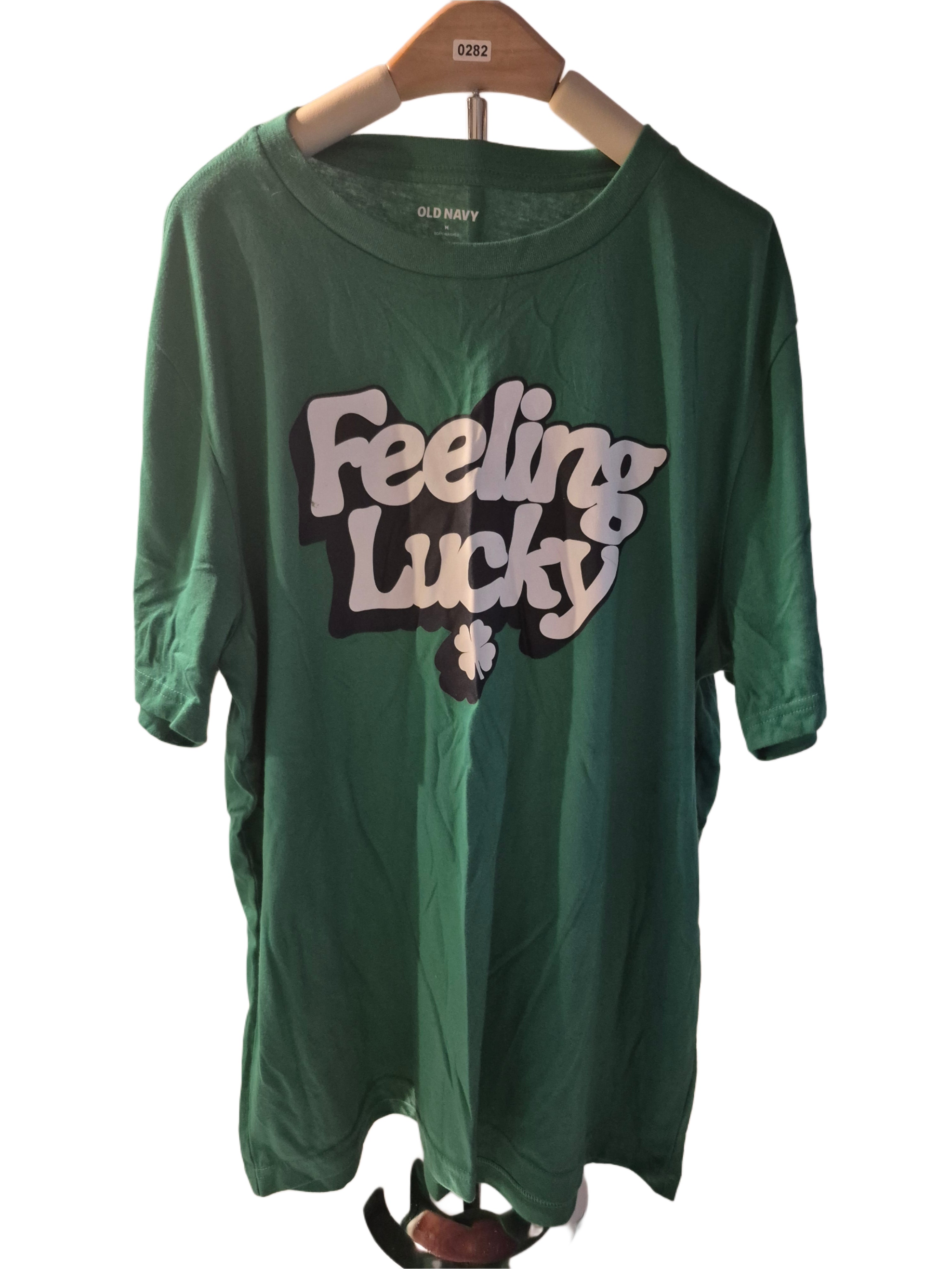 Old navy t shirt  ( feeling lucky)