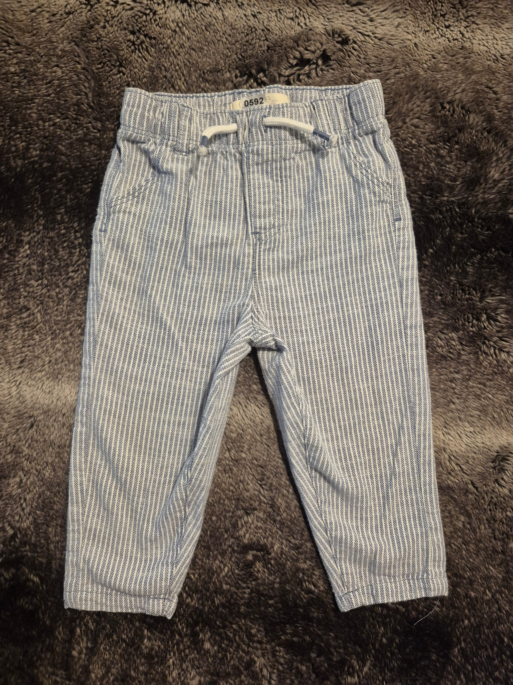 Mixed and matched striped pants