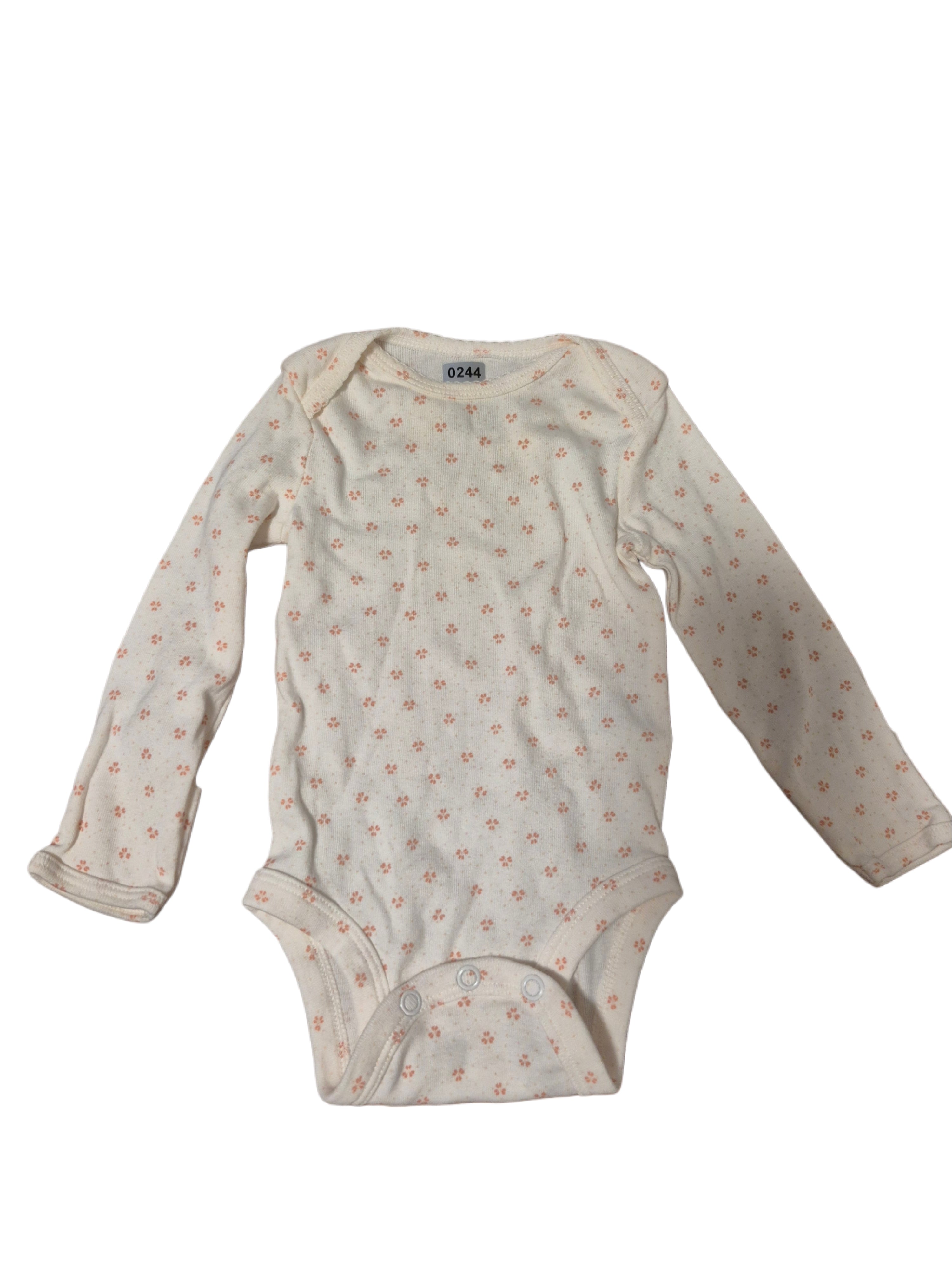 Baby girl long sleeved onesie white with flower graphics